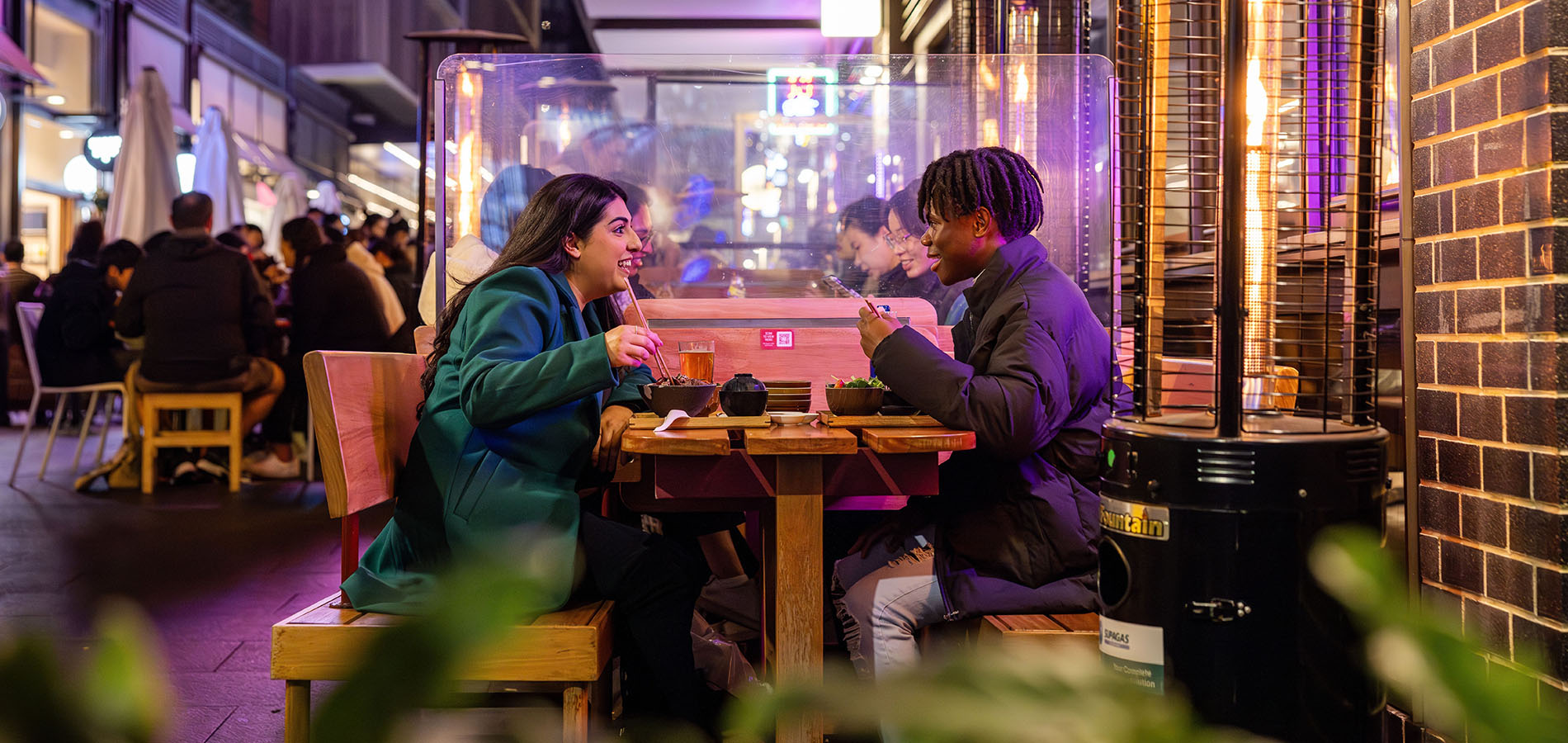 Couple eating at Darling Square